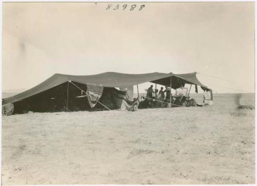 Life scene close shot of tent with men