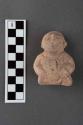 Fragmentary pottery figure- Archaic type