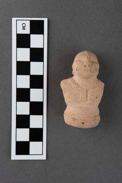 Fragmentary pottery figure- Archaic type