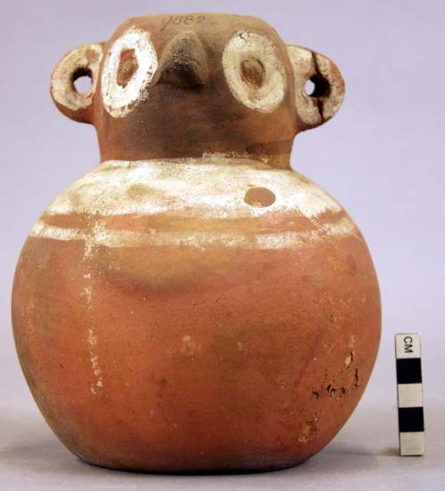 Vase with owl face