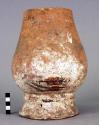 Earthen jar (fragments of bones in it)