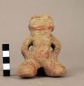 Small human pottery figure