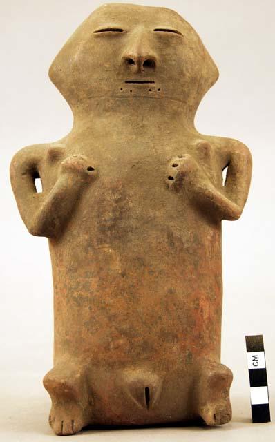 Terra cotta vase, grotesque human form