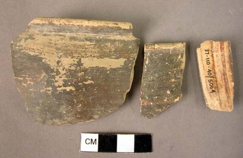 4 potsherds - monochrome black glazed rim fragments