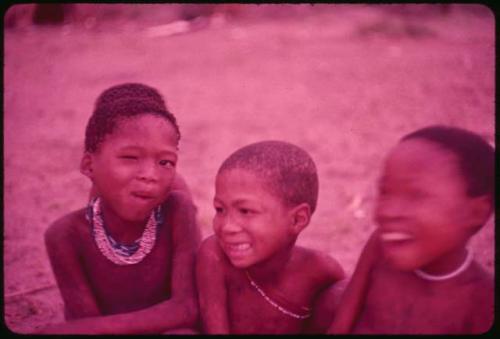 Three children sitting