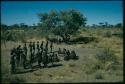 Expedition, Photography: Group of men dancing around a circle of women sitting (copy of slide 8A-93)