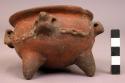 Small pottery bowl- red ware, thick flaring rim, 4 ornaments (animal heads) and