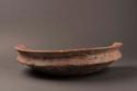 Flat pottery dish with low rim, fragment