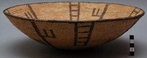 Basket bowl, coiled. Geometric designs.