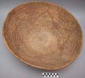 Large basket tray, coiled. Made of bear grass (natural and dyed red).