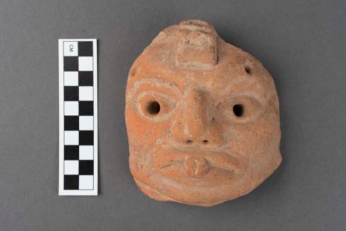 Ground stone mask