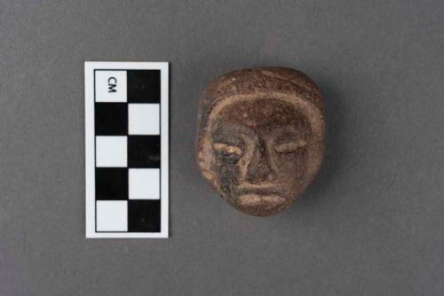 Stone figurine head