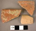 4 rim sherds, red urfirnis ware