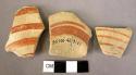 2 potsherds; 1 pottery base fragment