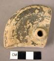 Perforated pottery lid (?) fragment of rhyton base