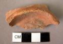 Pottery ring base fragment - red slipped, low burnish