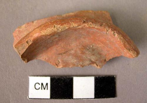 Pottery ring base fragment - red slipped, low burnish