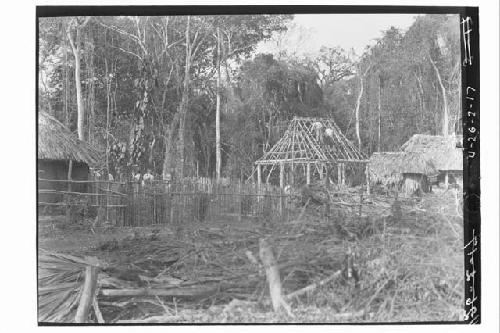 Men working on Shufeldt's house and fence