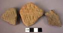 128 potsherds with cardial decoration