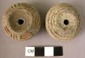 2 pottery spindle whorl with incised and colored designs
