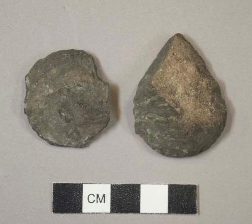 Chipped stone scrapers?, one is tear-drop shaped, gray