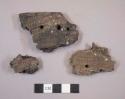 Ceramic sherds, impressed design, punctations and perforation