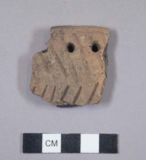 Ceramic rim sherd, incised decoration, punctations