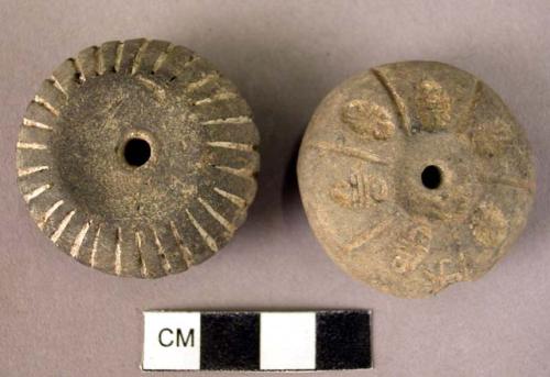 Pottery spindle whorl with incised and colored designs
