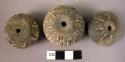 3 pottery spindle whorl with incised design