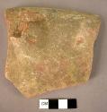 Deep plain ware, mottled rim of a pottery bowl fragment with trace of horizontal