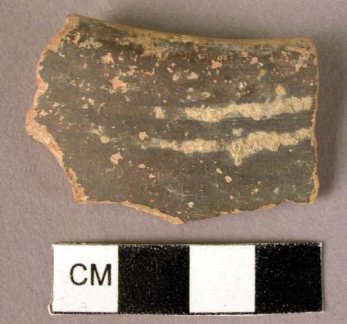 Potsherd - fugitive white on dark