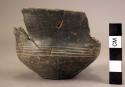 Fragment of pottery cup, incised and indented decoration