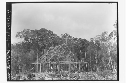 Men working on house