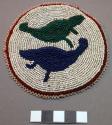 Round piece of cloth with beaded decoration - green & blue bird on white ground