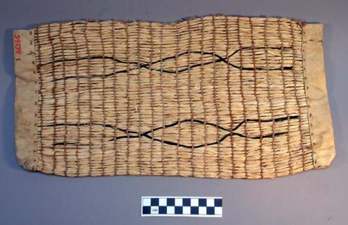 Small oblong bag. Made of elaeagnus bark with ends enclosed with buckskin, horsehair ornamentation.