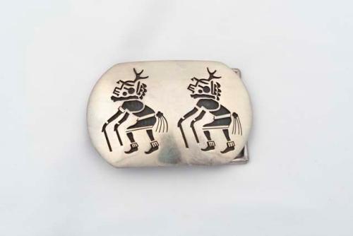 Silver overlay belt buckle of two deer dancers