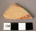 Potsherd - burnished slip and probably naturalistic pattern