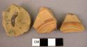 2 pottery base fragments; 1 potsherd - painted rings inside of bases