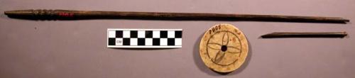 Spindle whorl, carved bone