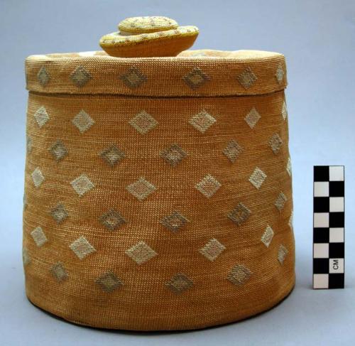 Covered basket - close twined weave, wool imbrication, rattle in cover.