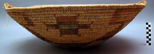 Large basket tray with handles. Coil technique. Made of bear grass. Geometric