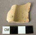 Unpainted pottery cylix fragment