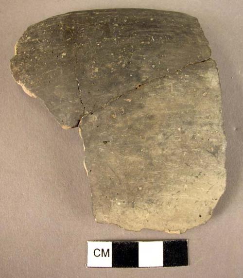 Rim sherd with handle fragment, gray minyan; rim sherd, gray minyan