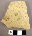 Potsherd, coarse yellow slipped ware, low polish