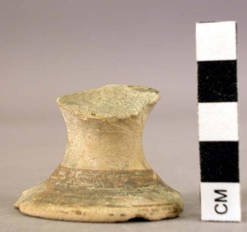 Foot of pottery goblet (?)