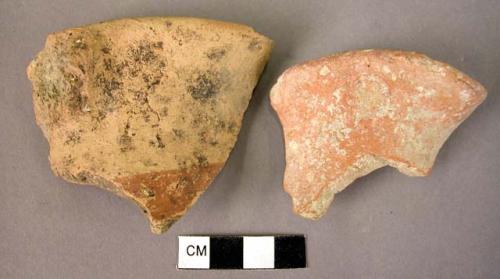 2 pottery rim fragments of pitcher mouths