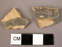 Pottery rim fragment & potsherd of dark on light cup