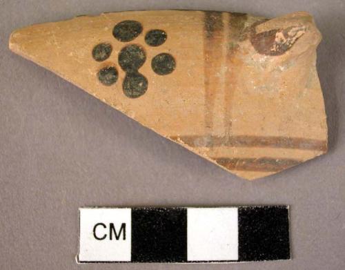 Rim potsherd with handle fragment