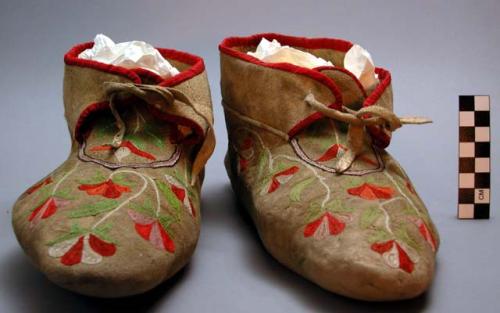 Pair of man's moccasins of light buckskin.