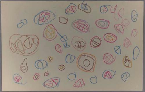 Circles with elements inside and squiggles in brown, blue, pink, and yellow